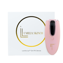 Load image into Gallery viewer, Pink Lumilia Lux™ 2-in-1 IPL laser hair removal and skin rejuvenation device with rose gold trim next to premium branded packaging. FDA cleared and NRCS certified for safe, at-home use in South Africa and worldwide.
