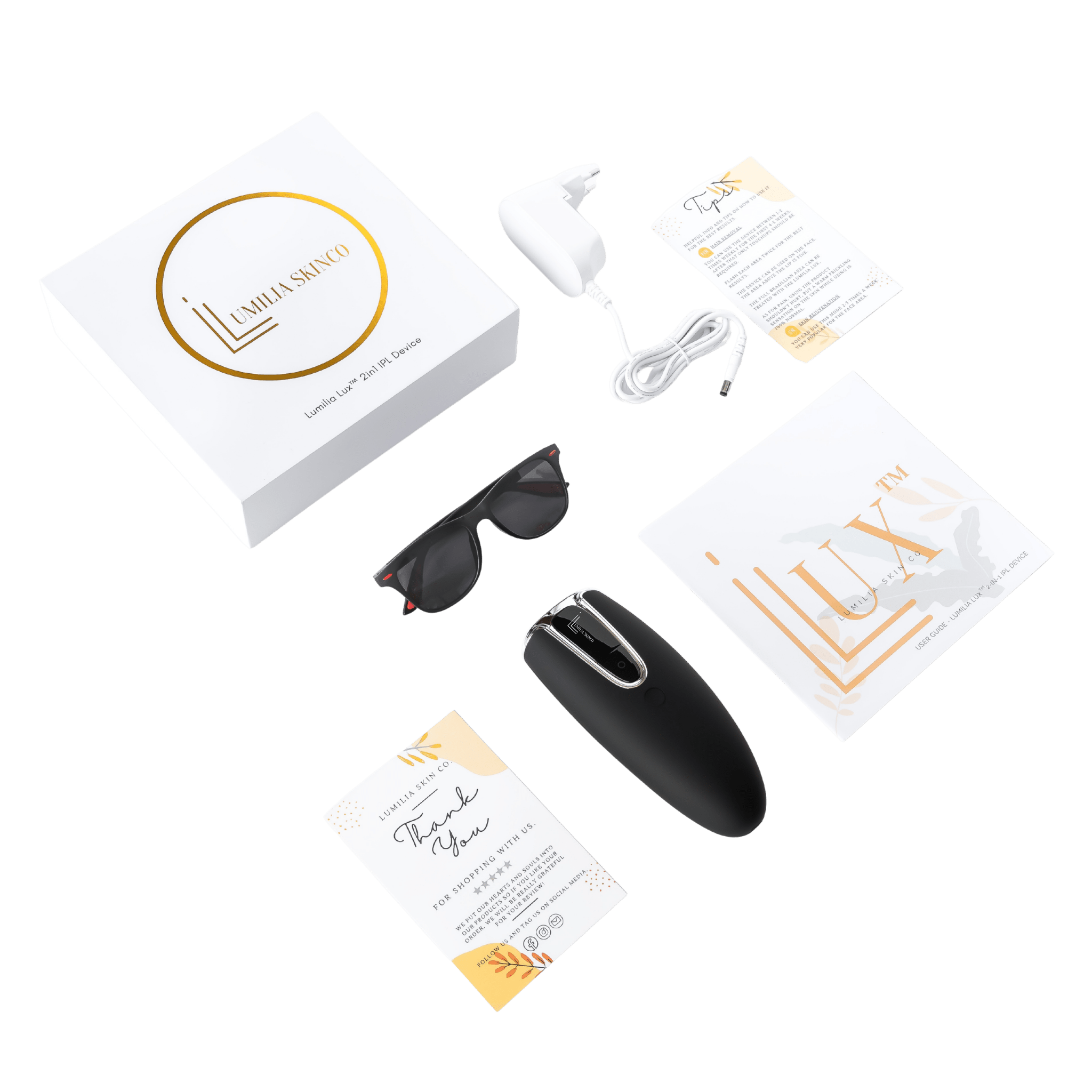 Lumilia Lux™ IPL laser hair removal set — device, premium branded packaging, protective sunglasses, charger and user guide.