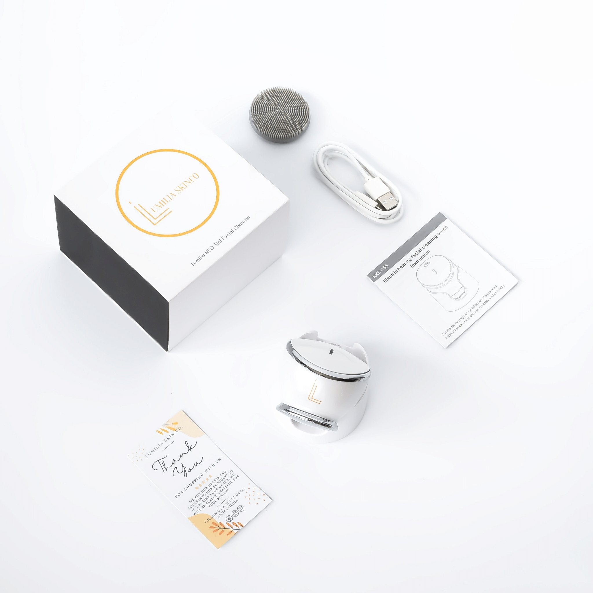 Lumilia NEO 3in1 Facial Cleansing & Massage Device full unboxed set – includes charging cable, brush head, user guide, and luxury gift box – ultimate skincare tool by Lumilia Skin Co.